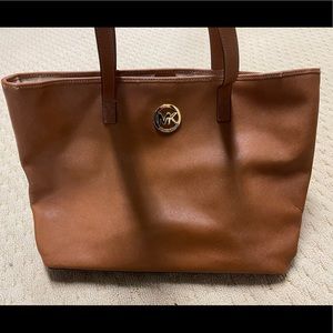 Cognac Michael kors tote with gold logo